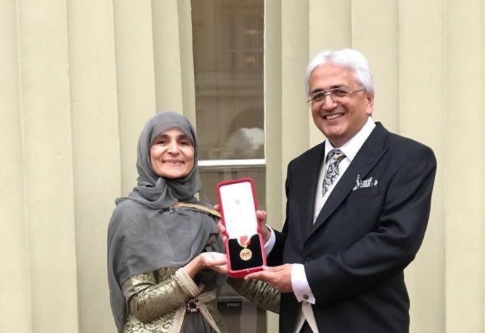 Professor Sir Alimuddin Zumla, with Lady Farzana Zumla when he received the Knighthood at Buckingham  Palace in November 2017 