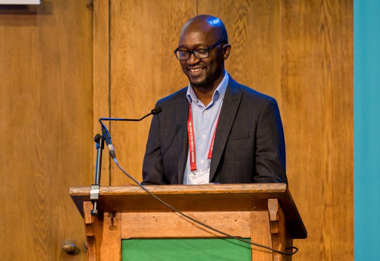 Dr Bern-Thomas Nyang'wa speaking at the RSTMH Annual Meeting 2023
