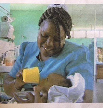 Nurse feeding a malnourished child in Jamaica (credit: Ann Ashworth)