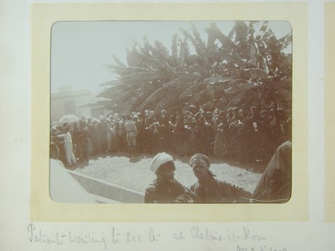 Patients waiting to be seen. Note police guards. Chebine el Kom, 1903