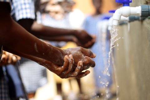 Handwashing station. Lagos, Nigeria. Credit: Rubenkells