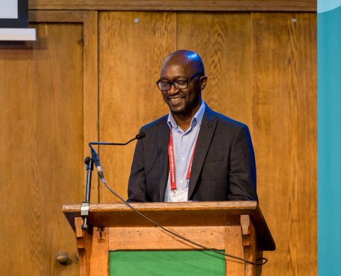 Dr Bern-Thomas Nyang'wa speaking at the RSTMH Annual Meeting 2023