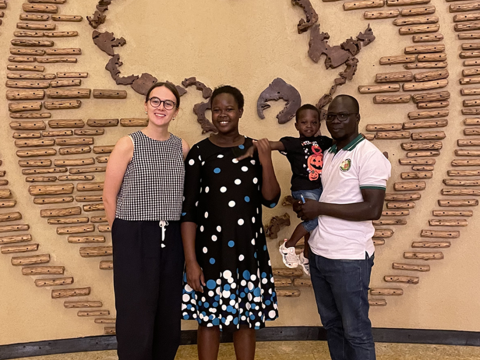 From left to right, Greta Holmes (RSTMH Grants Manager), Irene Atii, and Walter Okello, with their young child. From left to right, Greta Holmes (RSTMH Grants Manager), Irene Atii, and Walter Okello, with their young child.