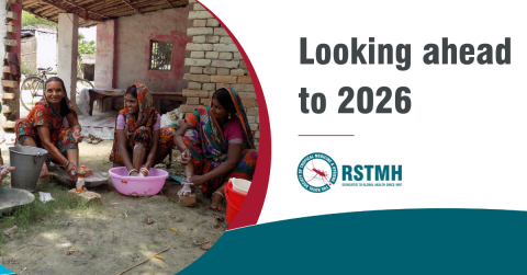 A photo shows women washing their feet, the text reads 'Looking ahead to 2026'.